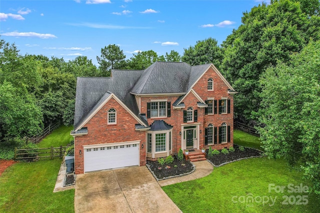6432 Morningsong Ln, Charlotte, NC 28269 - colonial inspired home featuring brick siding, driveway, a shingled roof, and an attached garage