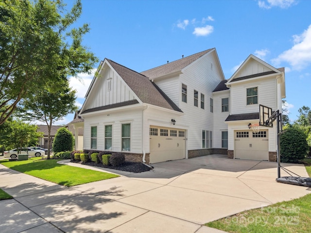 435 Galbreath Ct Unit 128, Fort Mill, SC 29708 - view of front of home featuring board and batten siding, driveway, roof with shingles, a garage, and a front lawn