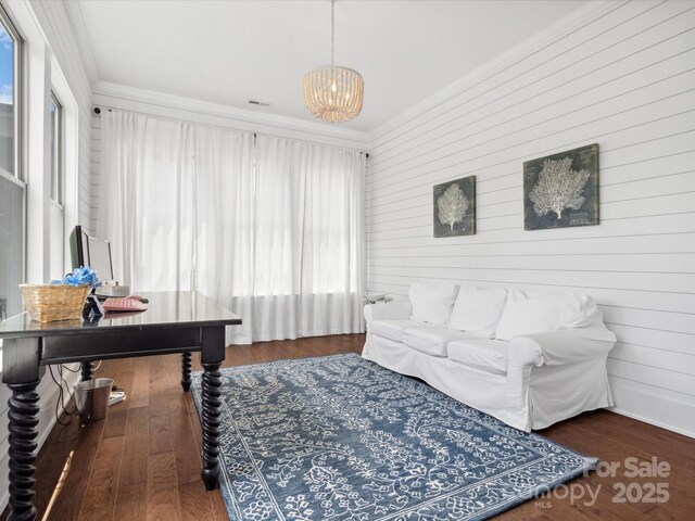 435 Galbreath Ct Unit 128, Fort Mill, SC 29708 - living room with a chandelier, ornamental molding, wood finished floors, and wooden walls