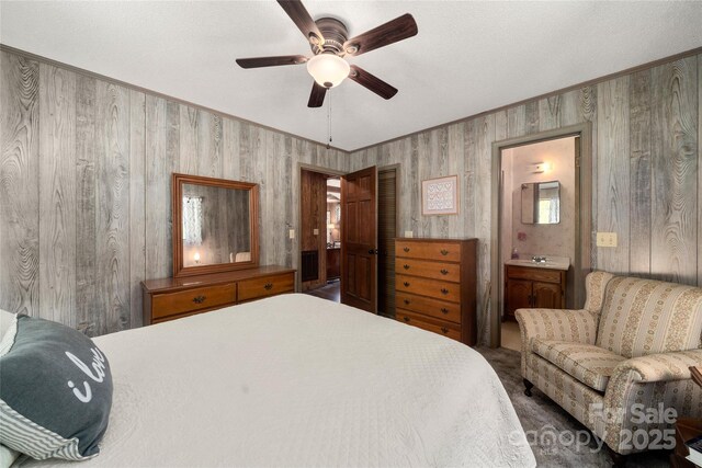 90 Eagles Nest Ln, Maggie Valley, NC 28751 - carpeted bedroom with ensuite bath, ceiling fan, and crown molding