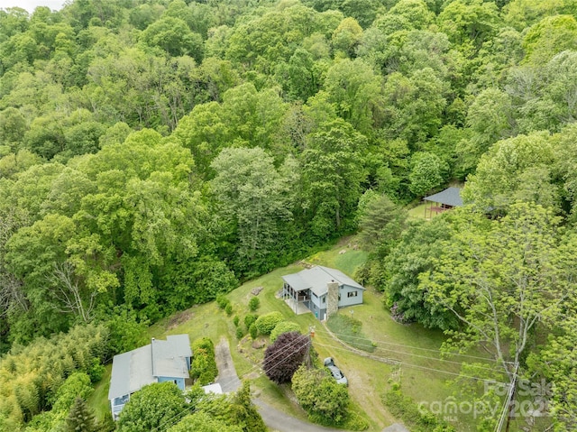 90 Eagles Nest Ln, Maggie Valley, NC 28751 - aerial view of property and surrounding area featuring a heavily wooded area