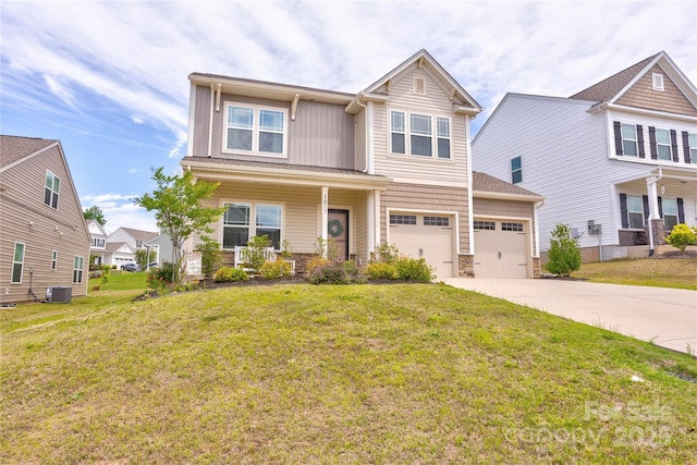 1077 River Haven Ave SW, Concord, NC 28025 - view of front facade featuring driveway, stone siding, covered porch, a front lawn, and board and batten siding