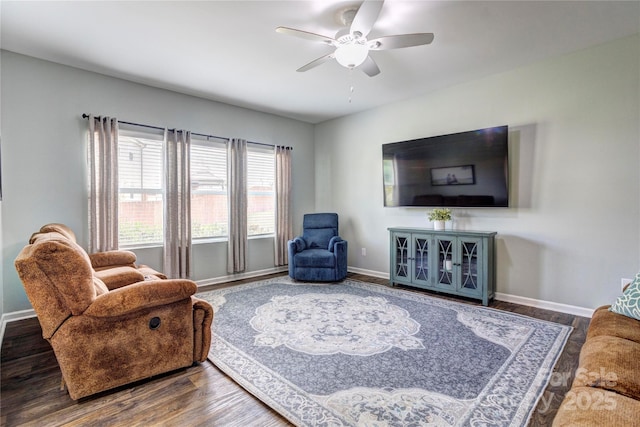 1077 River Haven Ave SW, Concord, NC 28025 - living room featuring wood finished floors, a ceiling fan, and baseboards
