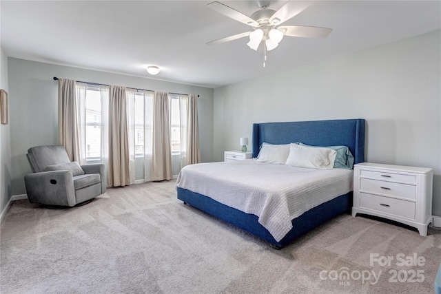 1077 River Haven Ave SW, Concord, NC 28025 - carpeted bedroom featuring a ceiling fan and baseboards