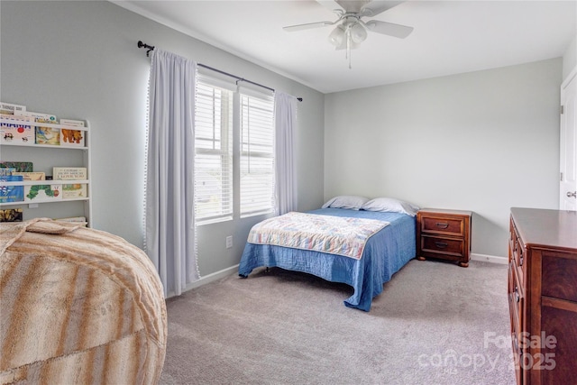 1077 River Haven Ave SW, Concord, NC 28025 - carpeted bedroom featuring baseboards and a ceiling fan