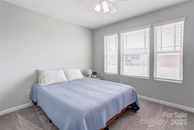 1077 River Haven Ave SW, Concord, NC 28025 - bedroom with baseboards, carpet floors, and ceiling fan