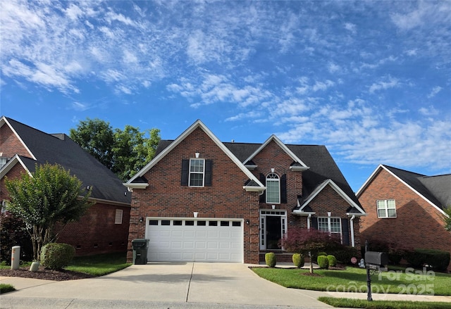 2563 Firethorn Ct, Gastonia, NC 28056 - traditional-style home with driveway, a garage, and brick siding