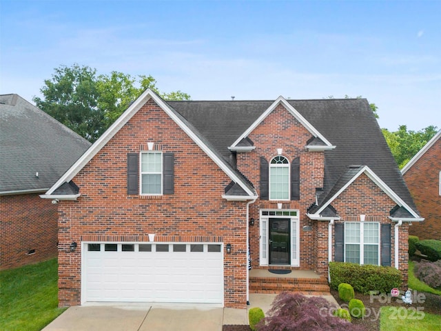 2563 Firethorn Ct, Gastonia, NC 28056 - traditional-style house with a garage, concrete driveway, and brick siding