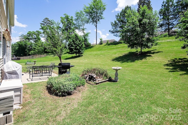 10792 Elsfield Ave NW, Concord, NC 28027 - view of green lawn featuring a patio