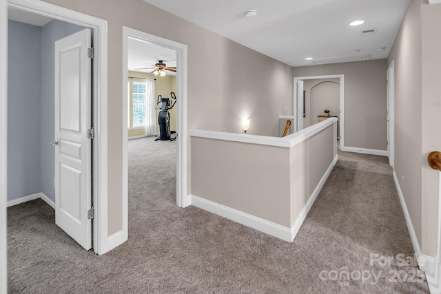 10792 Elsfield Ave NW, Concord, NC 28027 - corridor with carpet floors, an upstairs landing, baseboards, and recessed lighting
