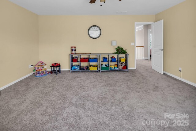 10792 Elsfield Ave NW, Concord, NC 28027 - playroom with a ceiling fan, carpet flooring, and baseboards