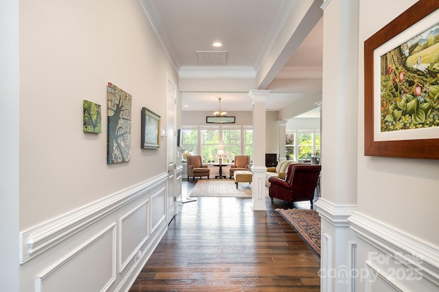 10016 St Kitts Landing Ln, Charlotte, NC 28278 - corridor with decorative columns, wainscoting, crown molding, dark wood-style flooring, and a decorative wall