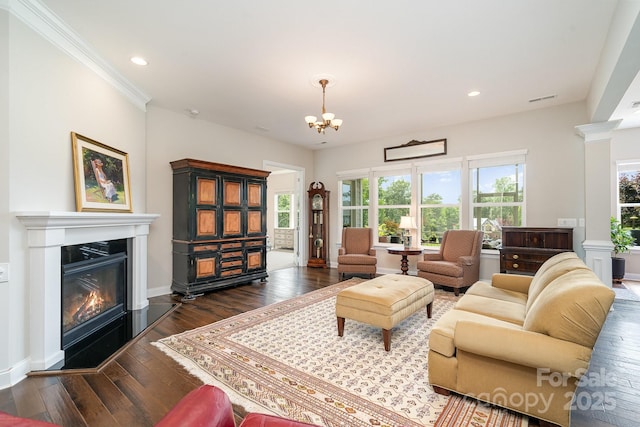 10016 St Kitts Landing Ln, Charlotte, NC 28278 - living room with a chandelier, dark wood finished floors, a glass covered fireplace, recessed lighting, and baseboards