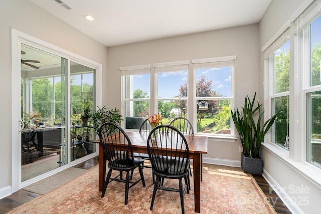 10016 St Kitts Landing Ln, Charlotte, NC 28278 - sunroom with baseboards, wood finished floors, and recessed lighting