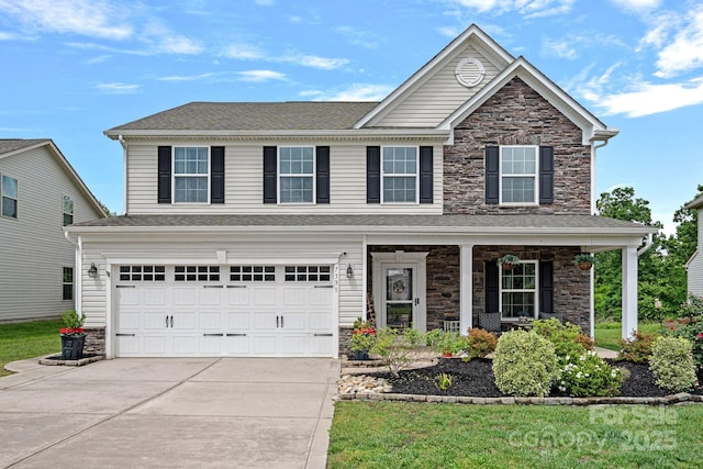 7331 Millstone Cir SW, Concord, NC 28025 - view of front facade featuring stone siding, driveway, an attached garage, and covered porch