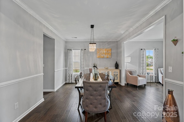 7331 Millstone Cir SW, Concord, NC 28025 - dining space with wood finished floors, baseboards, and crown molding