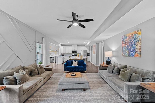 7331 Millstone Cir SW, Concord, NC 28025 - living room featuring a ceiling fan and wood finished floors