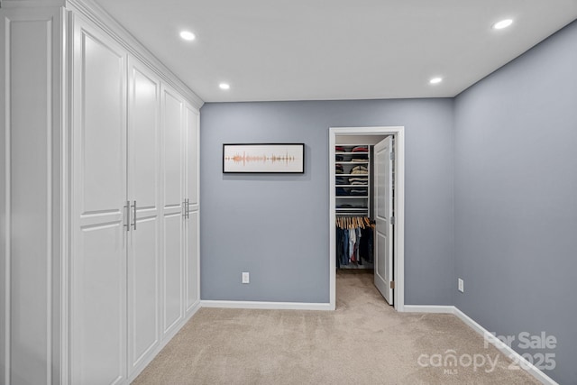 7331 Millstone Cir SW, Concord, NC 28025 - unfurnished bedroom featuring a spacious closet, light carpet, recessed lighting, baseboards, and a closet
