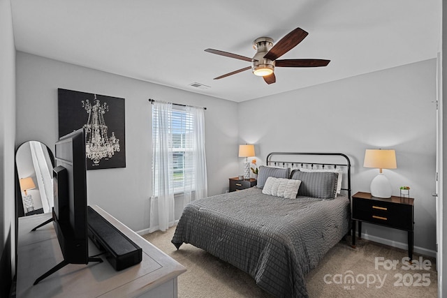7331 Millstone Cir SW, Concord, NC 28025 - carpeted bedroom featuring baseboards and a ceiling fan