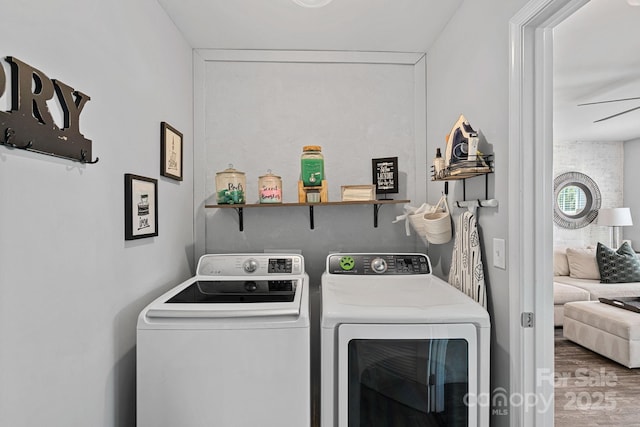 7331 Millstone Cir SW, Concord, NC 28025 - laundry area with independent washer and dryer and wood finished floors
