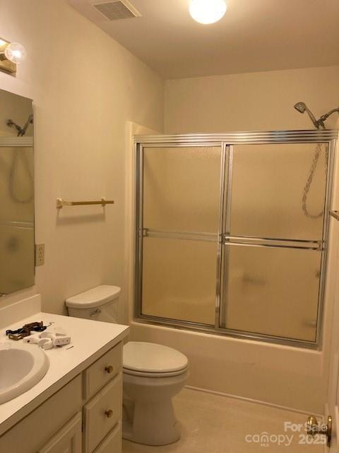 2222 Raven Dr, Rock Hill, SC 29732 - bathroom with vanity, toilet, and shower / bath combination with glass door