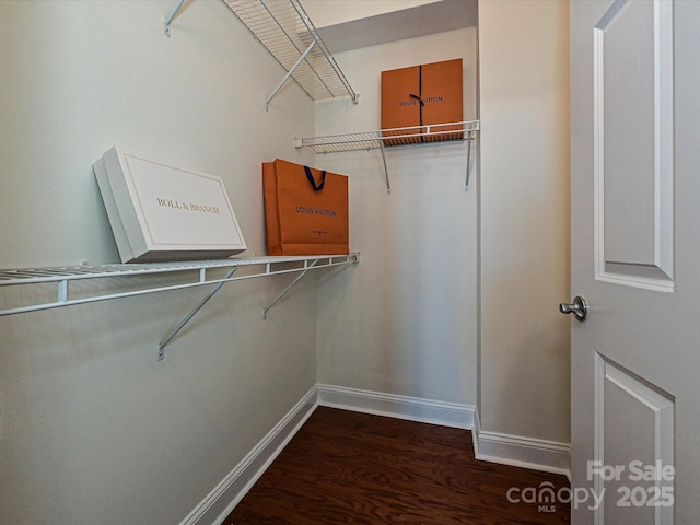 300 W 5th St Unit 723, Charlotte, NC 28202 - spacious closet featuring dark wood finished floors