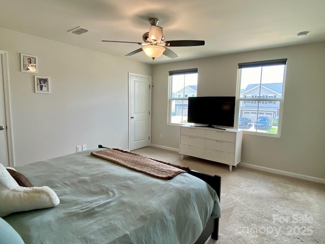 3113 Bouquet St, Charlotte, NC 28215 - bedroom with light carpet, baseboards, and a ceiling fan