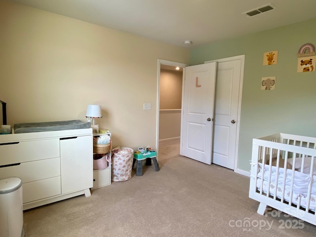 3113 Bouquet St, Charlotte, NC 28215 - bedroom with light carpet and a nursery area