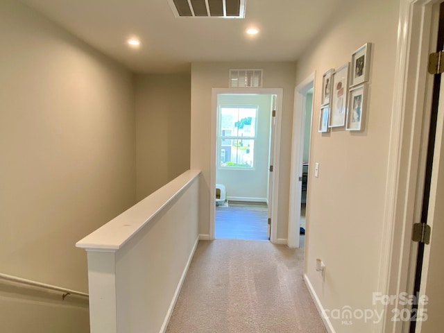 3113 Bouquet St, Charlotte, NC 28215 - corridor featuring recessed lighting, carpet floors, baseboards, and an upstairs landing