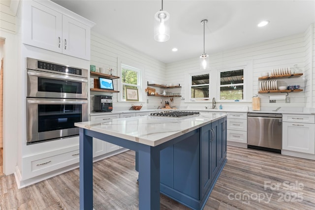 509 N Oak St, Lincolnton, NC 28092 - kitchen with open shelves, stainless steel appliances, light wood-type flooring, a sink, and recessed lighting