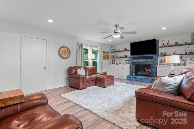 509 N Oak St, Lincolnton, NC 28092 - living room featuring a ceiling fan, a premium fireplace, wood finished floors, and recessed lighting