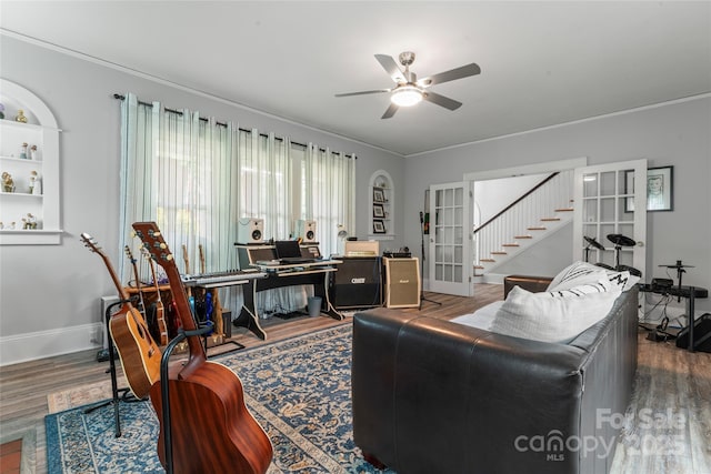 509 N Oak St, Lincolnton, NC 28092 - living room with wood finished floors, an office area, a ceiling fan, baseboards, and crown molding