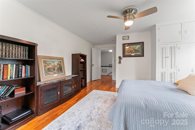 509 N Oak St, Lincolnton, NC 28092 - bedroom featuring light wood-style floors, radiator, a closet, ceiling fan, and baseboards