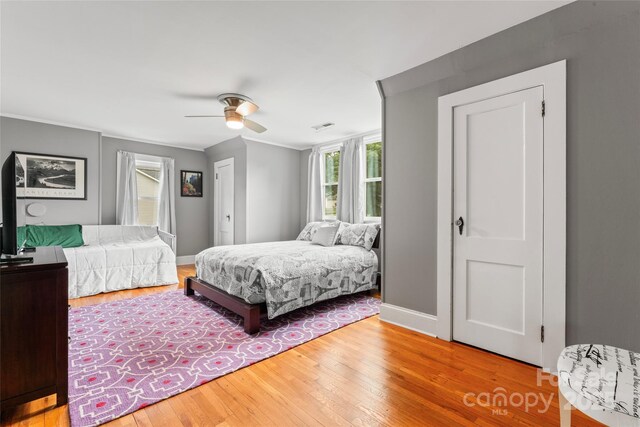 509 N Oak St, Lincolnton, NC 28092 - bedroom featuring hardwood / wood-style flooring, ceiling fan, and baseboards