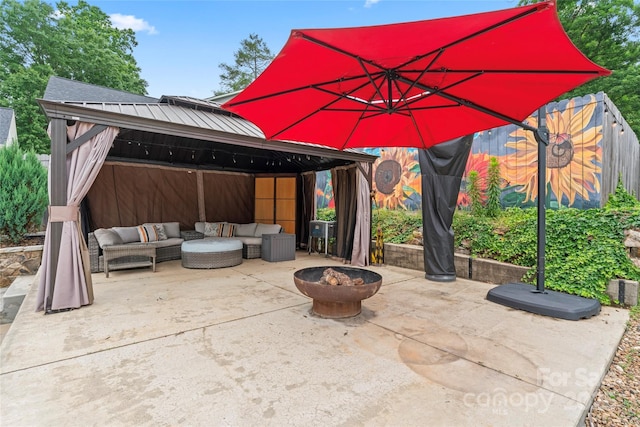 509 N Oak St, Lincolnton, NC 28092 - view of patio featuring a gazebo and an outdoor living space with a fire pit