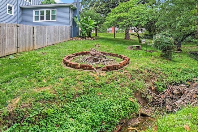 509 N Oak St, Lincolnton, NC 28092 - view of yard with an outdoor fire pit