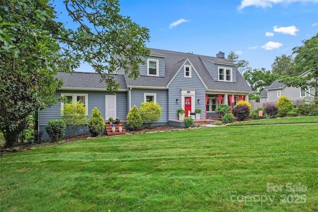509 N Oak St, Lincolnton, NC 28092 - view of front of property featuring a front lawn, a chimney, a shingled roof, and a porch