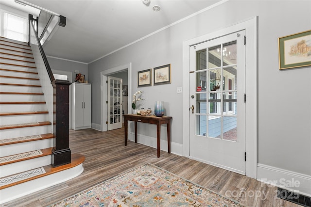 509 N Oak St, Lincolnton, NC 28092 - entrance foyer with stairs, wood finished floors, ornamental molding, baseboards, and french doors