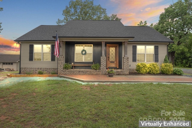 632 Skyland Dr N, Mount Pleasant, NC 28124 - view of front of house with a front yard and roof with shingles