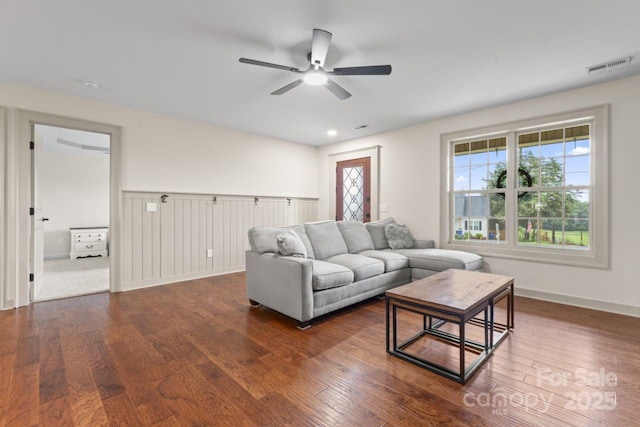 632 Skyland Dr N, Mount Pleasant, NC 28124 - living room featuring dark wood-type flooring, a ceiling fan, and baseboards
