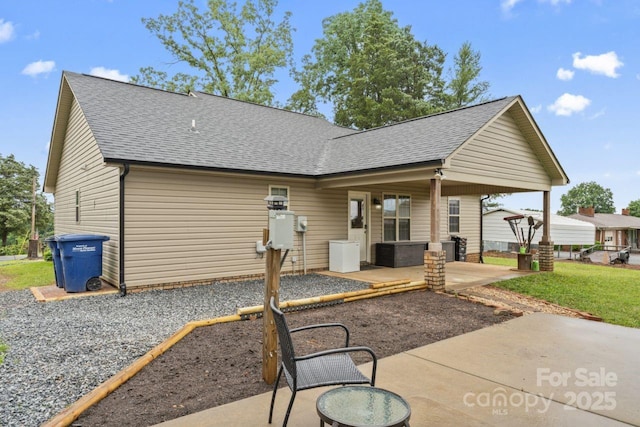 632 Skyland Dr N, Mount Pleasant, NC 28124 - back of house with roof with shingles and a patio area