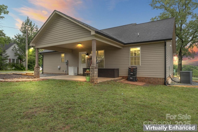 632 Skyland Dr N, Mount Pleasant, NC 28124 - back of house with a patio, a shingled roof, central air condition unit, and a lawn