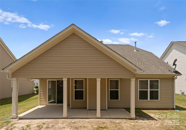 2236 Prairie Rd, Concord, NC 28027 - rear view of property with a patio, roof with shingles, and a lawn