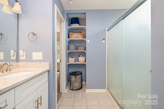16121 Wrights Ferry Rd, Charlotte, NC 28278 - bathroom featuring vanity, a shower stall, tile patterned flooring, and toilet