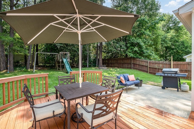 16121 Wrights Ferry Rd, Charlotte, NC 28278 - wooden deck featuring outdoor dining space, a grill, and a playground