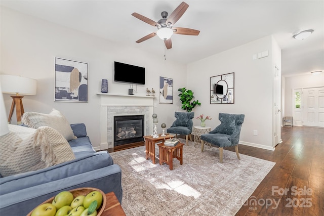 16121 Wrights Ferry Rd, Charlotte, NC 28278 - living area with dark wood-type flooring, ceiling fan, and a fireplace