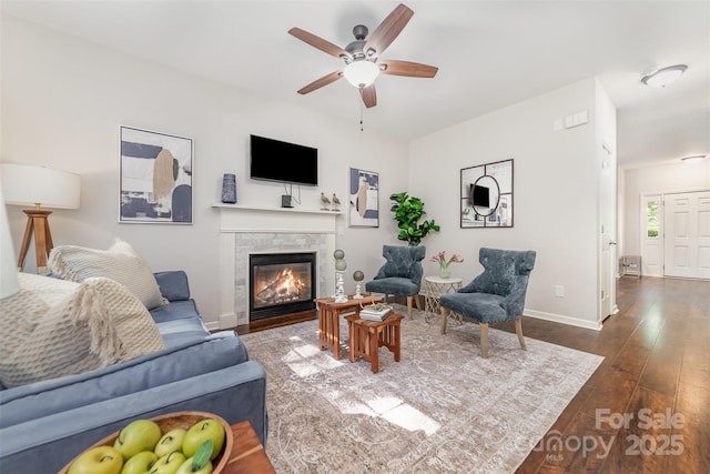 16121 Wrights Ferry Rd, Charlotte, NC 28278 - living area featuring dark wood-style floors, a ceiling fan, and a tiled fireplace