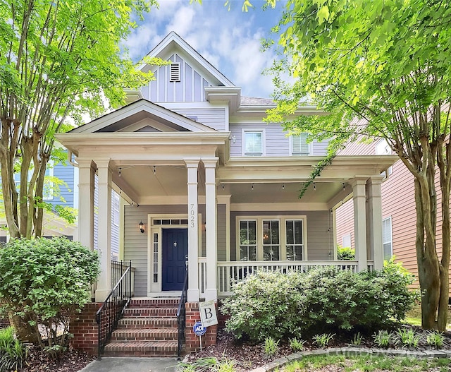 7023 Blakeney Greens Blvd, Charlotte, NC 28277 - view of front of property with covered porch and board and batten siding