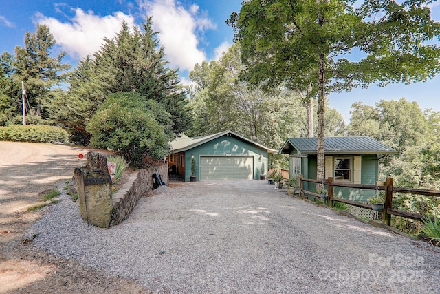 274 Slippery Rock Rd, Waynesville, NC 28785 - ranch-style home with metal roof and a detached garage