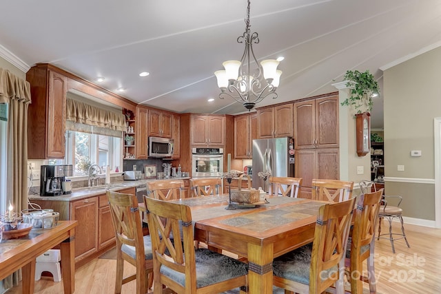 274 Slippery Rock Rd, Waynesville, NC 28785 - dining area featuring crown molding, light wood-style flooring, recessed lighting, a chandelier, and baseboards